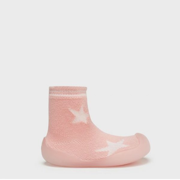 Calcetín con suela antideslizante de caucho rosa con estrellas